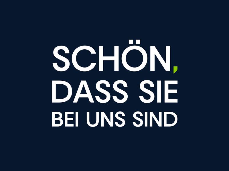 Schwarzer Hintergrund mit Schriftzug "Schön, dass Sie da sind"
